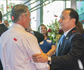 Erol-Congratulates-Doctor - Texas Hospital Association Erol-Congratulates-Doctor