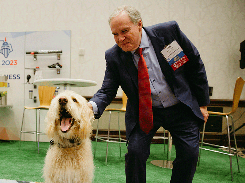 Petting dogs in the exhibit hall