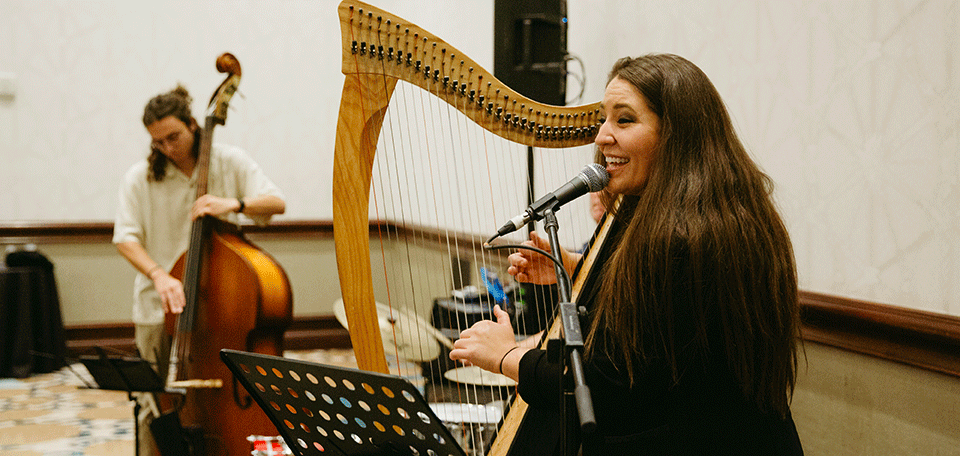 Musicians playing in the exhibit hall