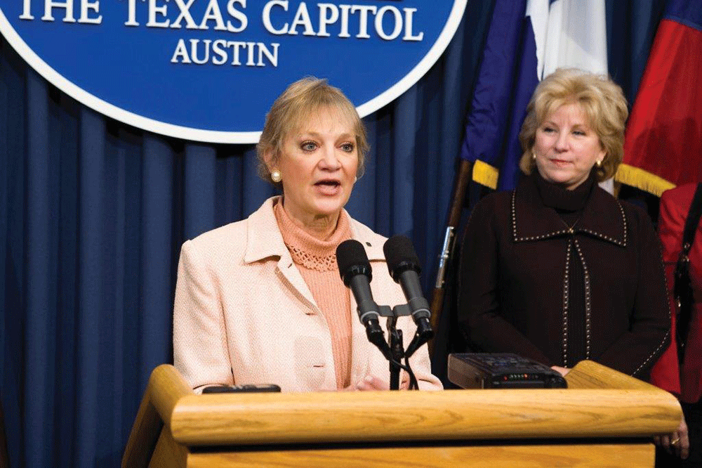 Sjoberg speaking about the nursing shortage at a press conference in the Texas Senate with former Senator and current Secretary of State Jane Nelson.