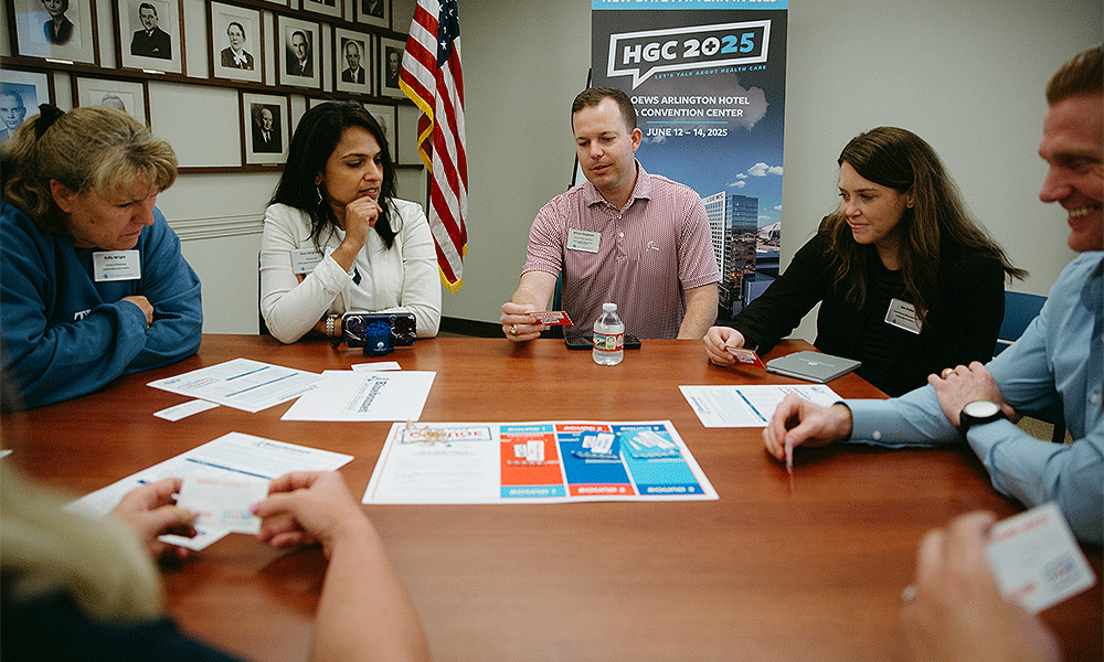 THA Leadership Fellows play THA's new hospital finance game. (Photo Credit: Natalie Guillot)