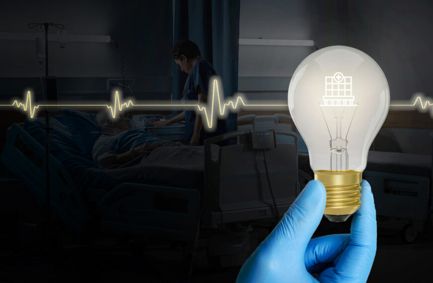 Gloved hand holding a glowing light bulb in front of a hospital ICU scene with a patient and a heartbeat line across the image.