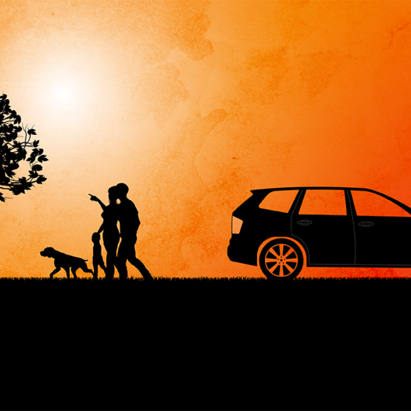 Silhouetted family and dog beside a car at sunset, with two trees framing the scene and one person pointing ahead.