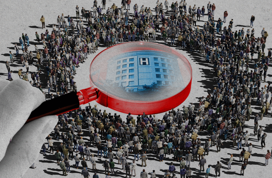 A hand holding a red magnifying glass over a large crowd forming a circle around a hospital building, highlighting the hospital amid people.